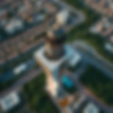 Aerial view of Meera Tower surrounded by lush greenery and vibrant urban life.